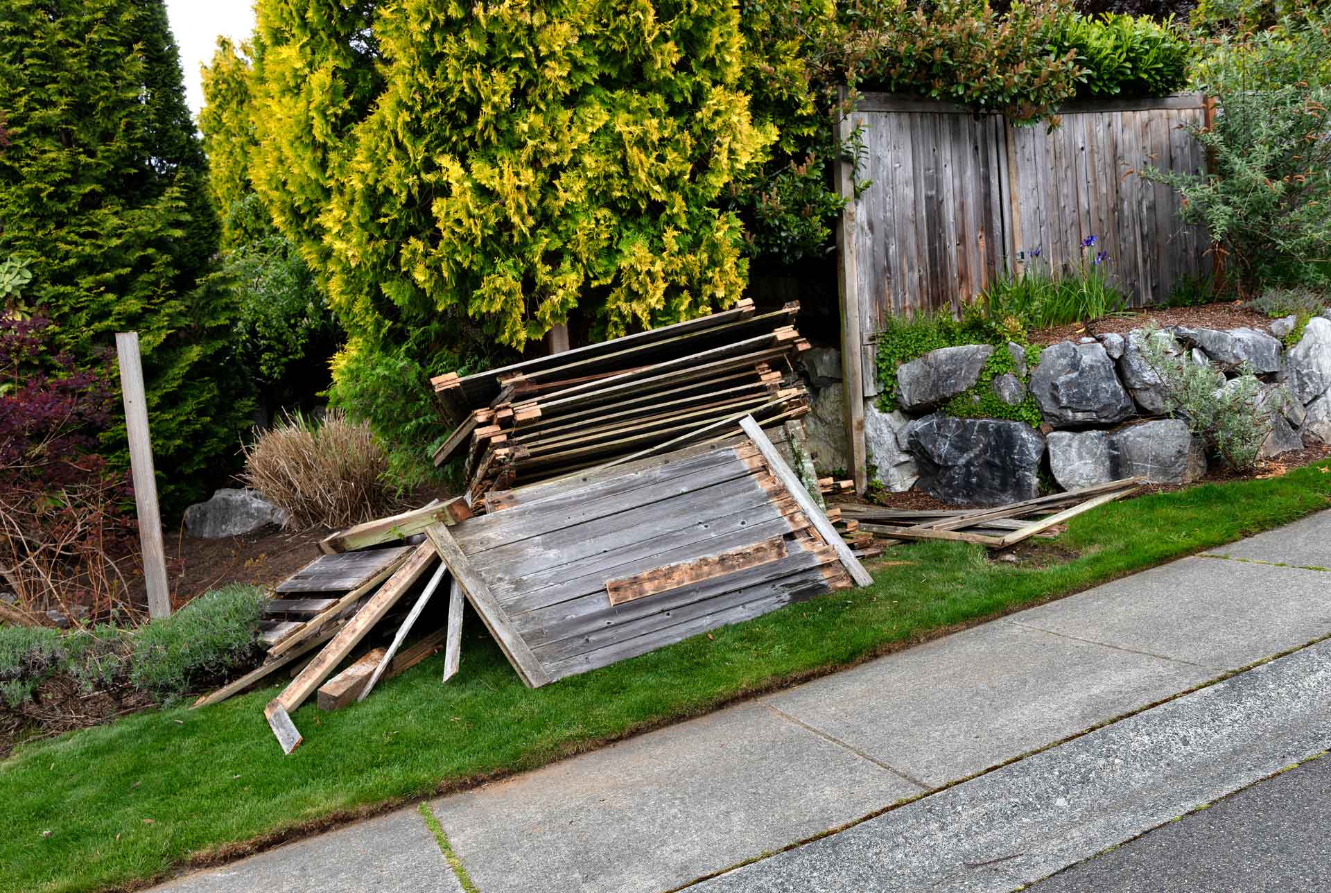 In-progress wooden fence removal